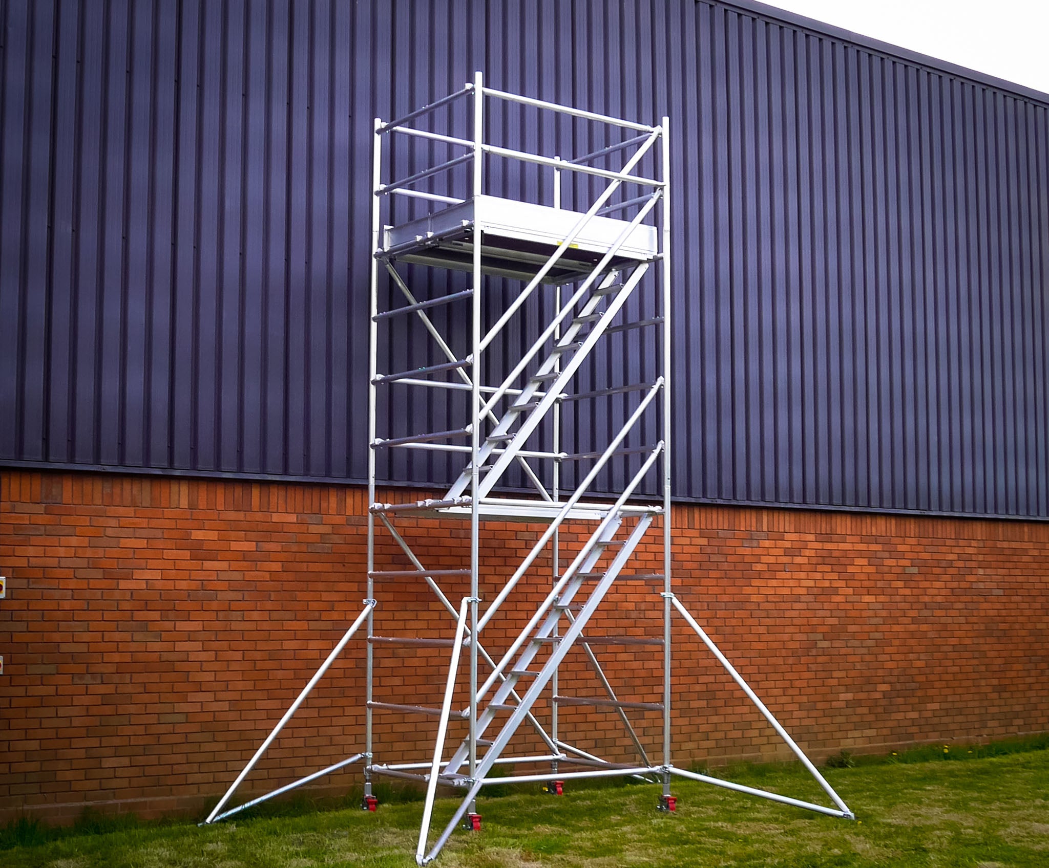 An Alto HD Stair Tower next to a commercial building.