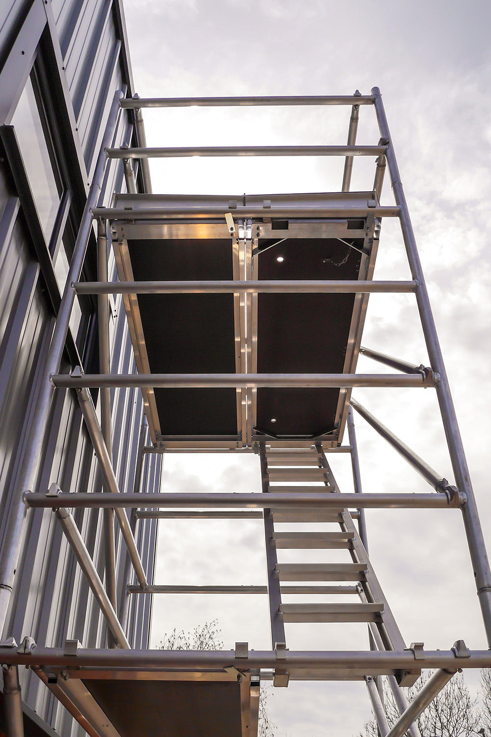 A photo looking up at an Alto HD Stair Tower.