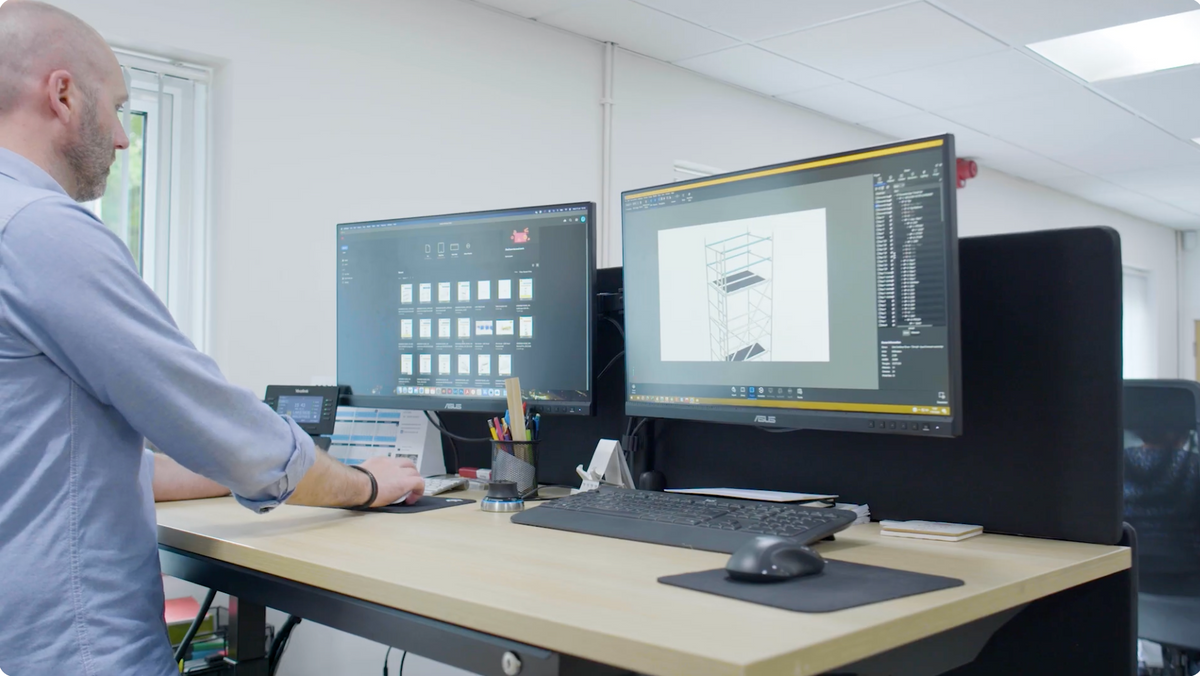 Alto designer working at computer