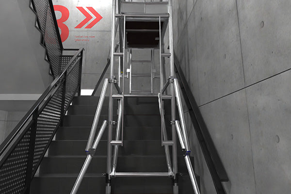A photo showing the Alto Stairwell Pro Tower on an emergency exit staircase.