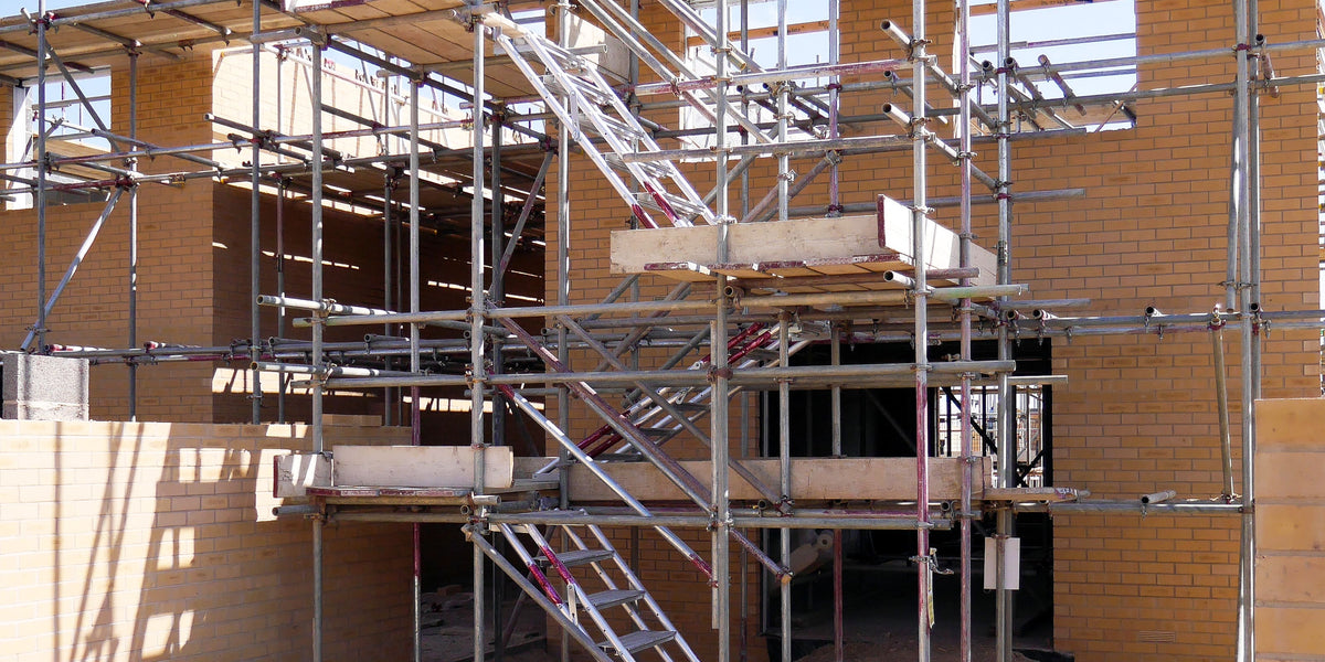 New home under construction with Alto Universal Stairs used for access.