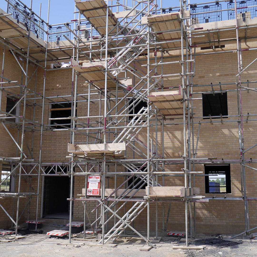 A large staircase constructed on a building site using Alto Universal Stairs