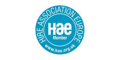 A circular blue and white HAE Europe member badge with the text 'HIRE ASSOCIATION EUROPE', 'HAE Member', and 'www.hae.