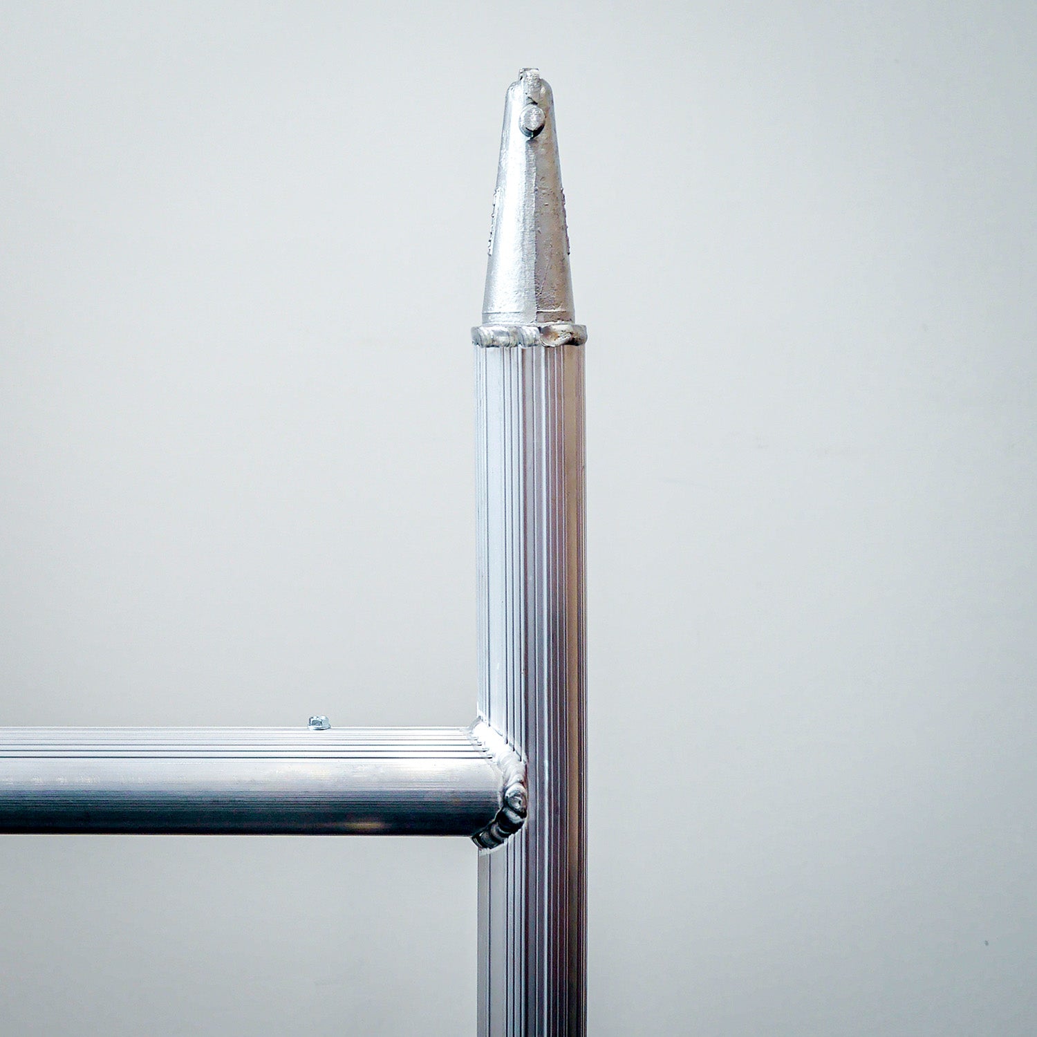 Close-up of the top fitting on an Alto Medium Duty tower frame. 