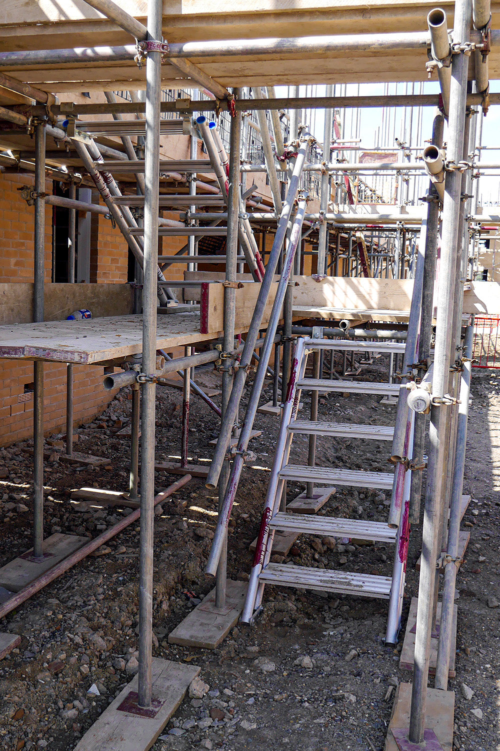 New home under construction with  Alto Universal Stairs used for access.