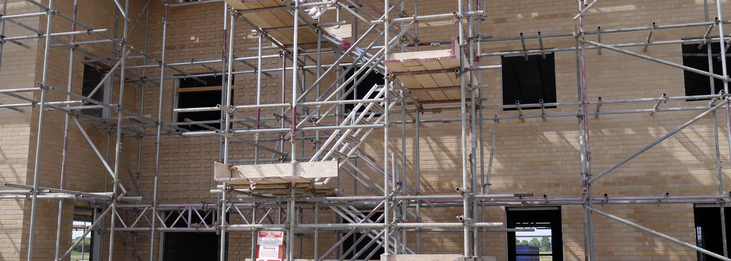 A scaffold stair tower using Alto Universal Stairs constructed on a building site.